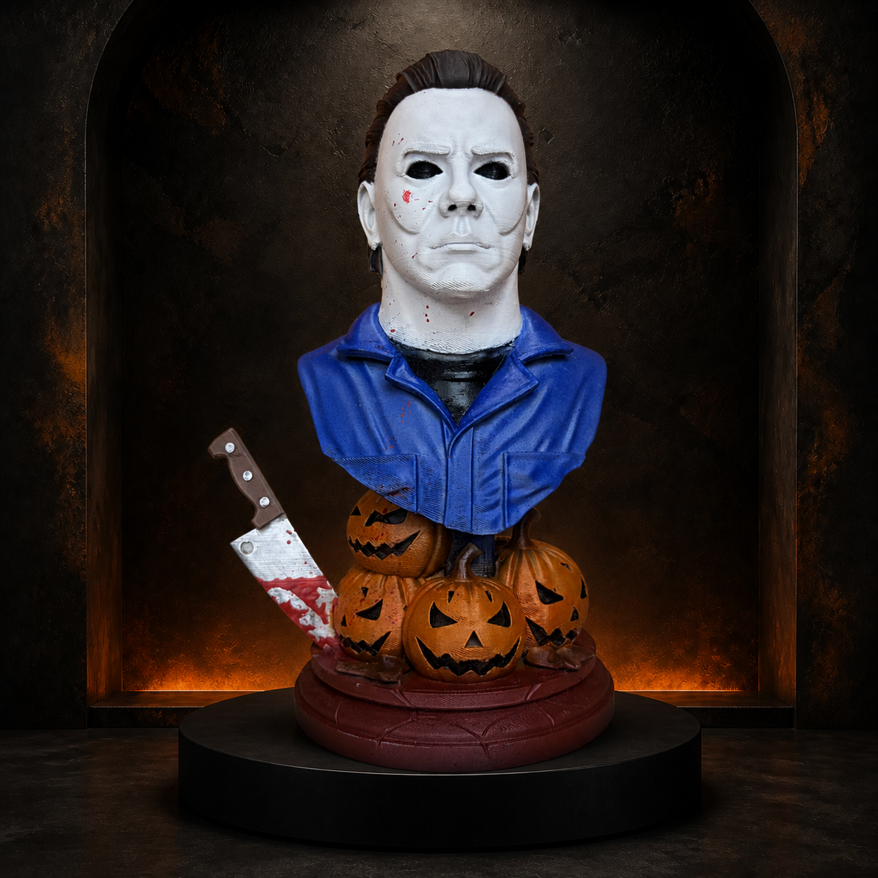 Masked pumpkin horror bust on the Burnt Toast studio plinth