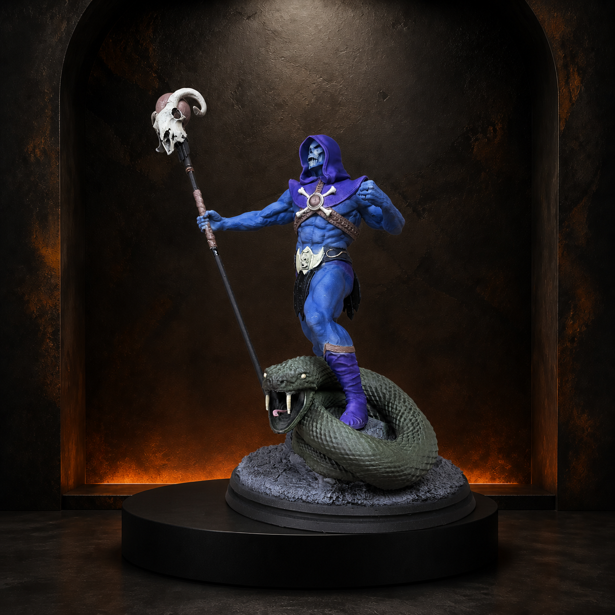 Blue skull sorcerer and serpent statue on the Burnt Toast studio plinth